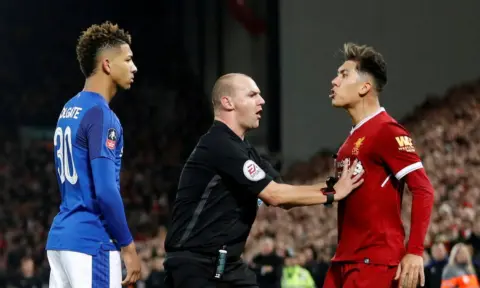 Roberto Firmino cleared by FA over Holgate racism allegations