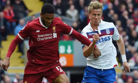 Joe Gomez ruled out of remaining fixtures and World Cup following surgery