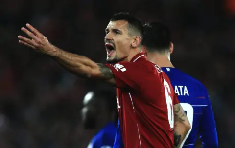 Liverpool centre-back Dejan Lovren linked with surprise summer move abroad