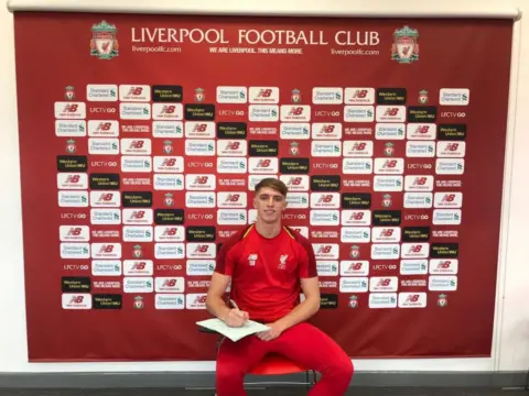 Liverpool sign talented young goalkeeper to first professional contract