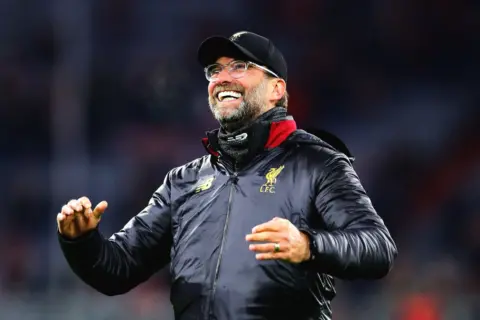 Photos: Jubilant scenes at the Allianz as Liverpool reach Champions League quarter-finals