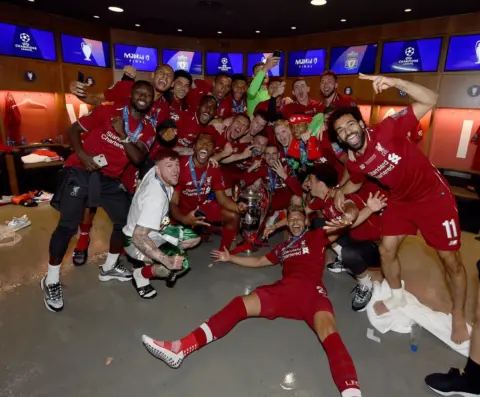 Brilliant scenes in the dressing room as Reds celebrate European glory in Madrid