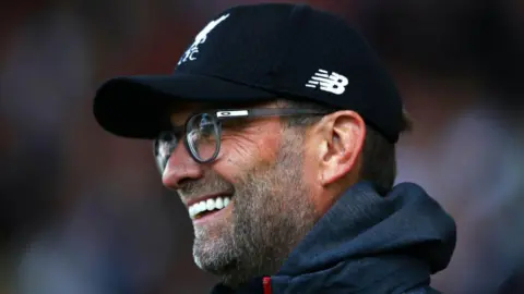 Jurgen Klopp and Jordan Henderson urge Reds to ‘keep going’ after win over Chelsea