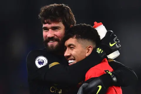 The best photos as Firmino strikes late winner for resilient Liverpool