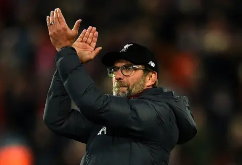 Klopp insists Liverpool aren’t feeling the pressure with “long way to go”