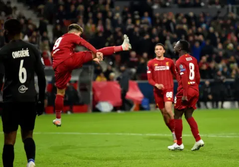 The best snaps as Liverpool beat Salzburg to reach Champions League last 16