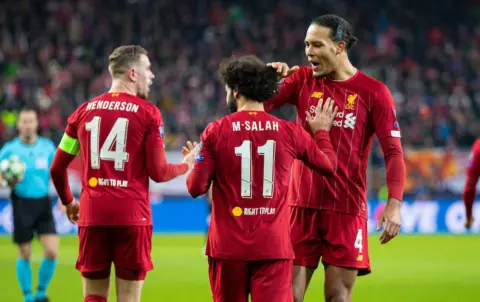 Virgil van Dijk hails Reds teammates as Liverpool reach Champions League last 16