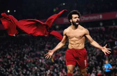 The best photos as Liverpool beat Manchester United to continue Premier League march