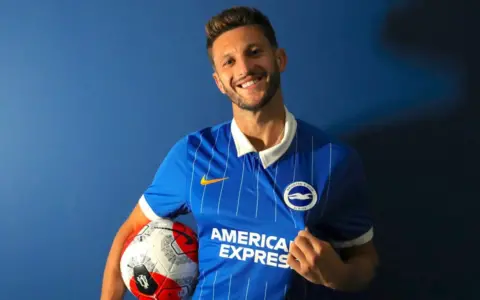 Brighton confirm signing of Adam Lallana on three-year deal