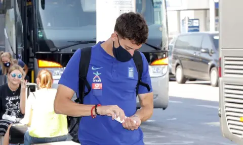 Kostas Tsimikas in self-isolation after testing positive for coronavirus