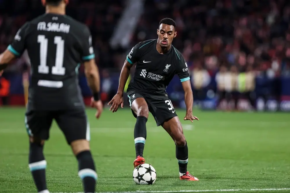 Ryan Gravenberch warming up for Liverpool; he has been named in the starting lineup against Newcastle and is expected to play at right-back.