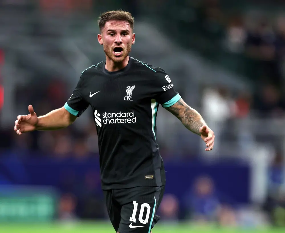 Alexis Mac Allister celebrating his stoppage-time winning goal for Liverpool against Nottingham Forest after VAR review.