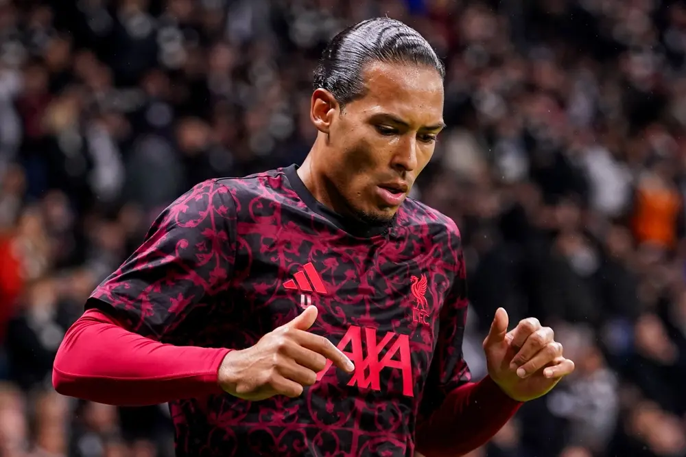 Virgil van Dijk celebrating his historic late winning goal against Everton