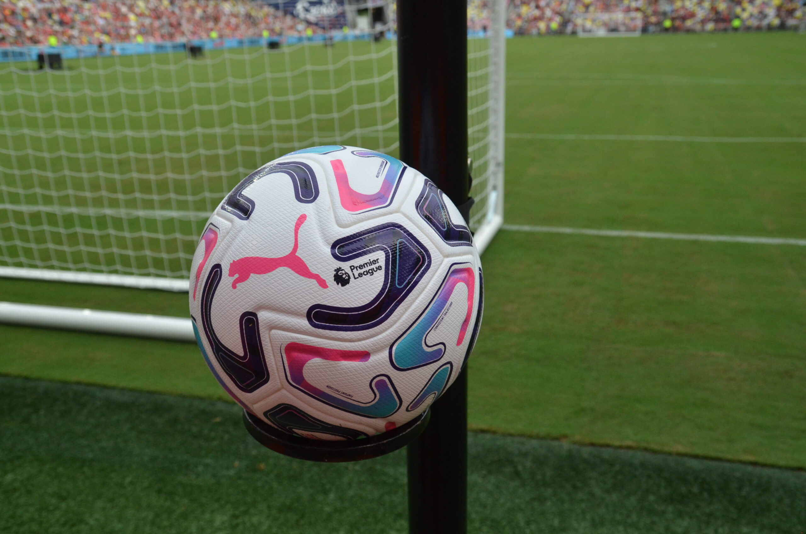 A Puma Premier League match ball resting on a stand on the pitch during the Liverpool USA Tour