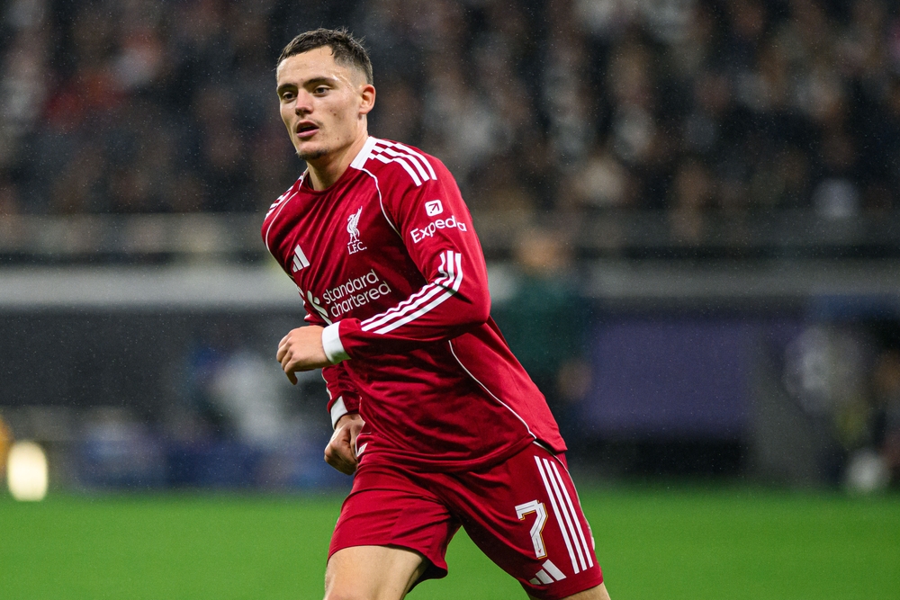Florian Wirtz running on the pitch in a Liverpool kit during the pre-season match against AS Monaco at Anfield