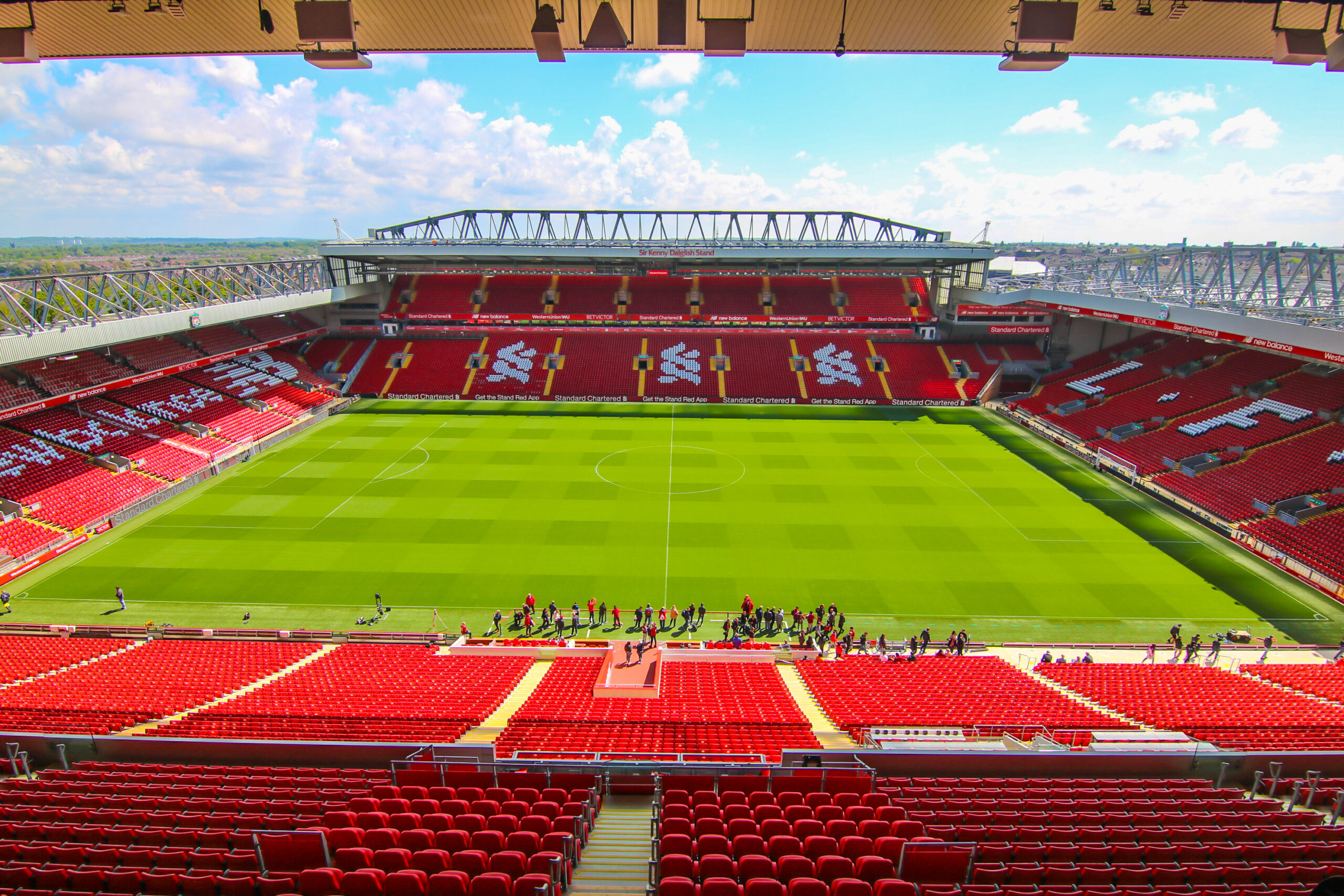 Elevated interior view of an empty Anfield Stadium and green pitch before Liverpool vs Monaco
